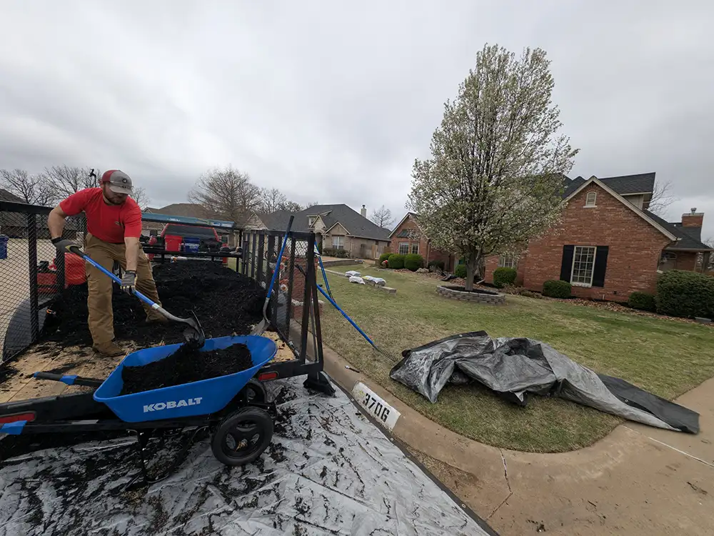man setting up to do lawncare services